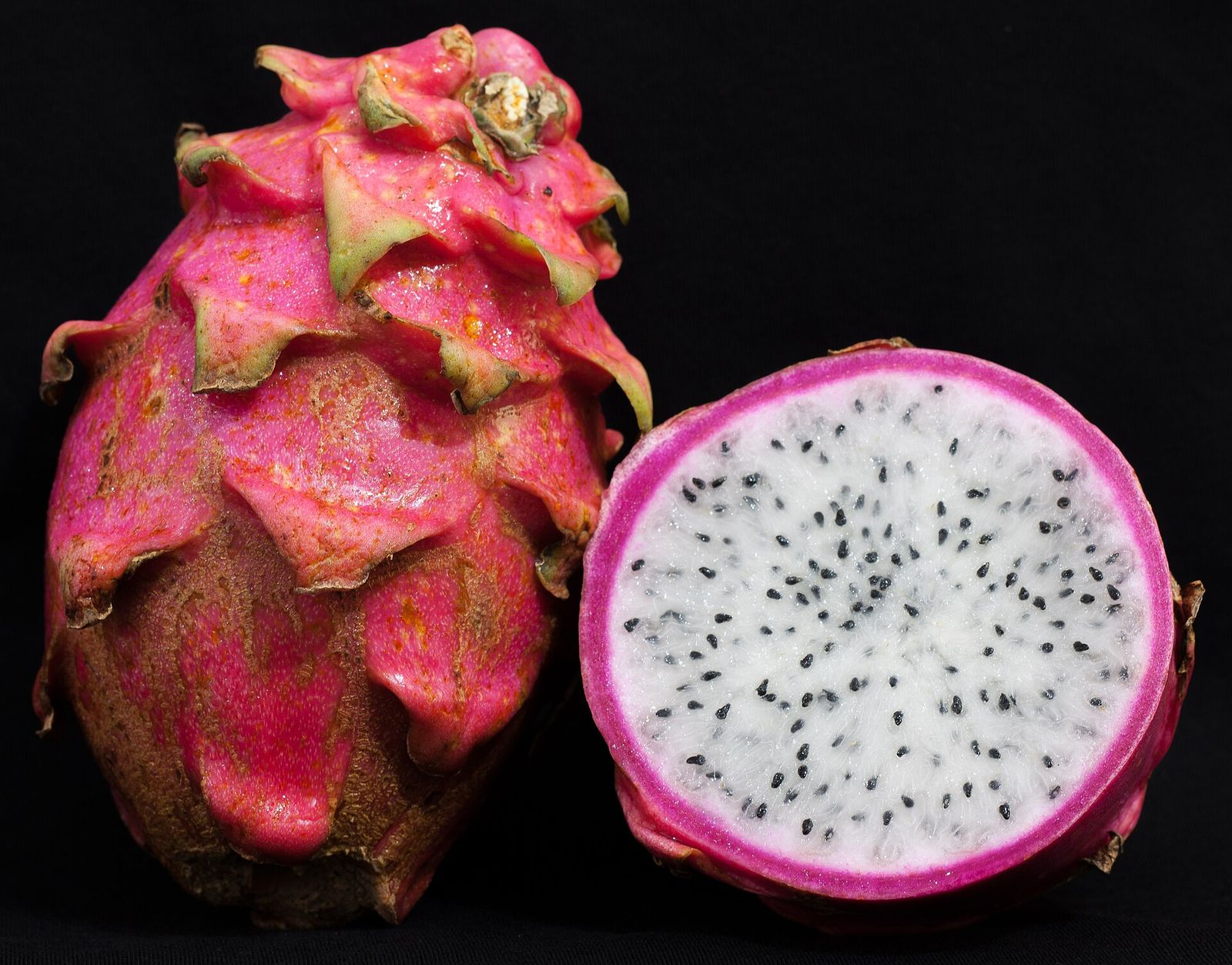 Dragon fruit, whole and halved